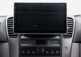 Подержанный автомобиль Kia Sorento 2006 года (14 фото)