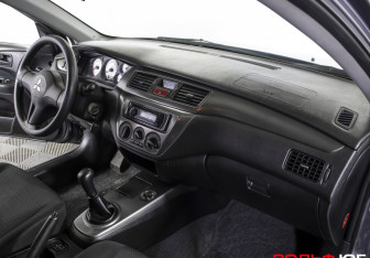 Подержанный автомобиль Mitsubishi Lancer Sedan 2009 года (9 фото)