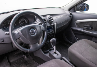 Подержанный автомобиль Nissan Almera Sedan 2013 года (9 фото)