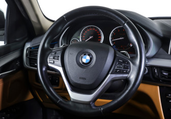 Подержанный автомобиль BMW X6 2016 года (13 фото)