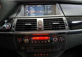 Подержанный автомобиль BMW X6 M 2013 года (15 фото)