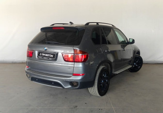 Подержанный автомобиль BMW X5 2012 года (7 фото)