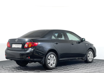 Подержанный автомобиль Toyota Corolla Sedan 2008 года (5 фото)