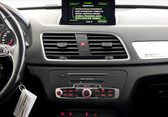 Подержанный автомобиль Audi Q3 2015 года (15 фото)