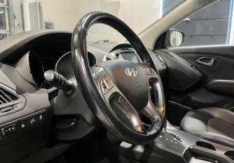 Подержанный автомобиль Hyundai ix35 2013 года (11 фото)