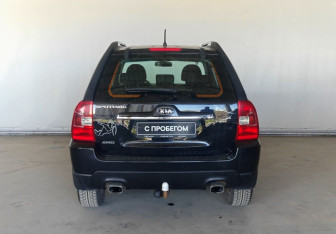 Подержанный автомобиль Kia Sportage 2010 года (6 фото)