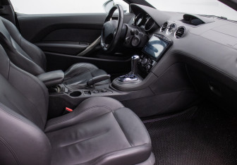 Подержанный автомобиль Peugeot RCZ 2011 года (9 фото)