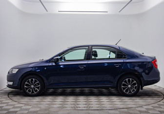 Подержанный автомобиль Skoda Rapid Liftback 2014 года (8 фото)