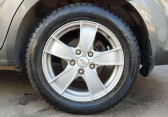 Подержанный автомобиль Kia Ceed Wagon 2011 года (13 фото)