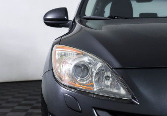 Подержанный автомобиль Mazda 3 Hatchback 2009 года (20 фото)