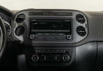 Подержанный автомобиль Volkswagen Tiguan 2014 года (11 фото)