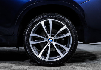 Подержанный автомобиль BMW X6 2016 года (15 фото)