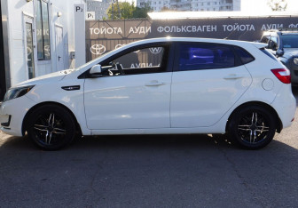 Подержанный автомобиль Kia Rio Hatchback 2013 года (8 фото)