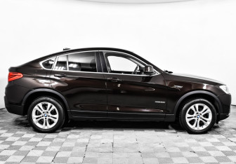 Подержанный автомобиль BMW X4 2015 года (4 фото)