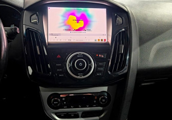 Подержанный автомобиль Ford Focus Wagon 2012 года (14 фото)