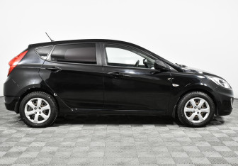 Подержанный автомобиль Hyundai Solaris Hatchback 2012 года (4 фото)