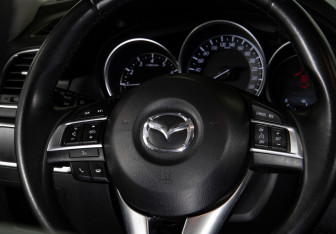 Подержанный автомобиль Mazda CX-5 2015 года (12 фото)