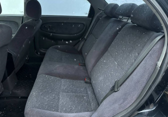 Подержанный автомобиль Kia Spectra Sedan 2007 года (10 фото)