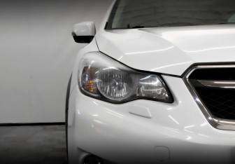 Подержанный автомобиль Subaru XV 2014 года (17 фото)