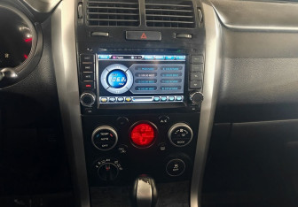 Подержанный автомобиль Suzuki Grand Vitara 2011 года (14 фото)