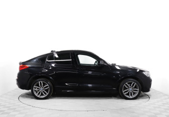 Подержанный автомобиль BMW X4 2018 года (4 фото)