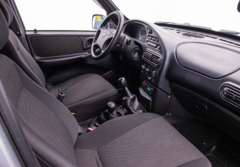 Подержанный автомобиль Chevrolet Niva 2007 года (9 фото)