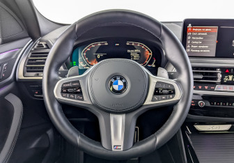 Подержанный автомобиль BMW X4 2024 года (21 фото)