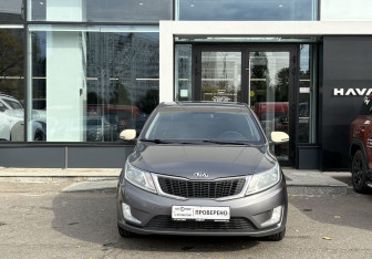 Подержанный автомобиль Kia Rio Hatchback 2013 года (2 фото)