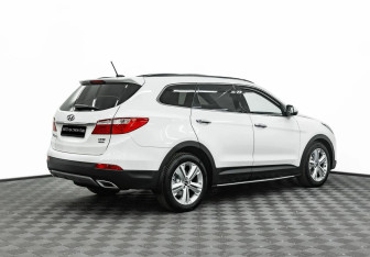 Подержанный автомобиль Hyundai Santa Fe 2014 года (3 фото)