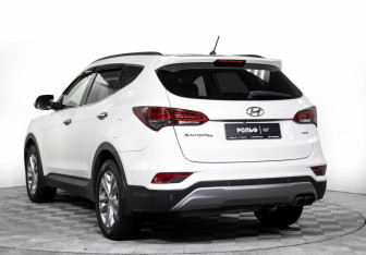Подержанный автомобиль Hyundai Santa Fe 2015 года (7 фото)