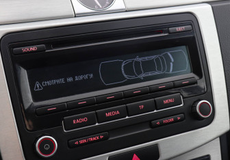 Подержанный автомобиль Volkswagen Passat Sedan 2013 года (13 фото)