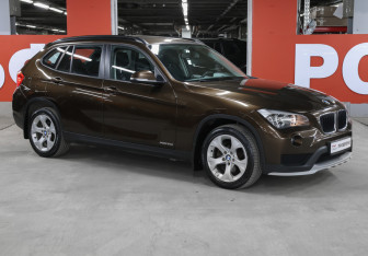 Подержанный автомобиль BMW X1 2014 года (3 фото)