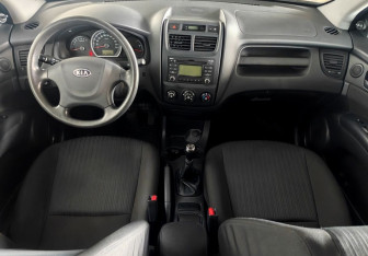 Подержанный автомобиль Kia Sportage 2009 года (9 фото)