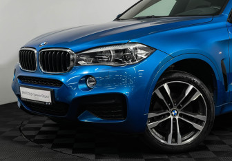 Подержанный автомобиль BMW X6 2018 года (19 фото)