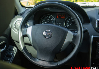 Подержанный автомобиль Nissan Terrano 2015 года (11 фото)