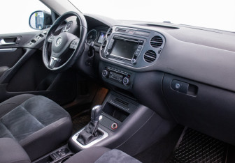 Подержанный автомобиль Volkswagen Tiguan 2014 года (10 фото)