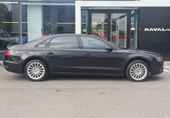 Подержанный автомобиль Audi A8 2014 года (4 фото)