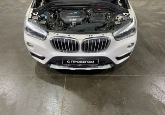 Подержанный автомобиль BMW X1 2017 года (18 фото)