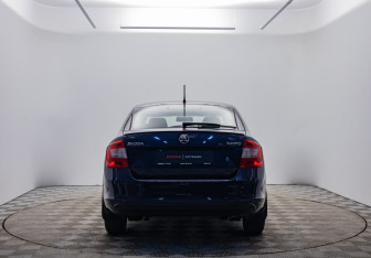 Подержанный автомобиль Skoda Rapid Liftback 2014 года (6 фото)