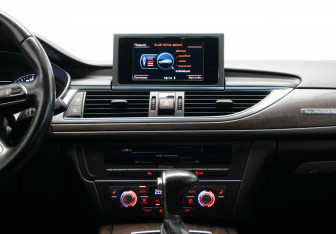 Подержанный автомобиль Audi A6 allroad 2014 года (23 фото)