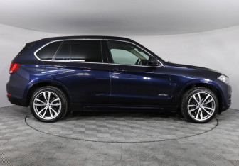 Подержанный автомобиль BMW X5 2014 года (6 фото)