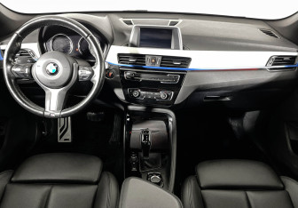 Подержанный автомобиль BMW X1 2018 года (12 фото)
