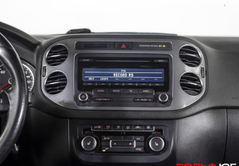 Подержанный автомобиль Volkswagen Tiguan 2014 года (14 фото)