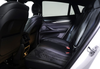 Подержанный автомобиль BMW X6 2018 года (11 фото)
