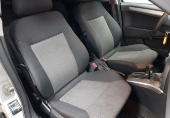 Подержанный автомобиль Opel Astra Wagon 2014 года (16 фото)