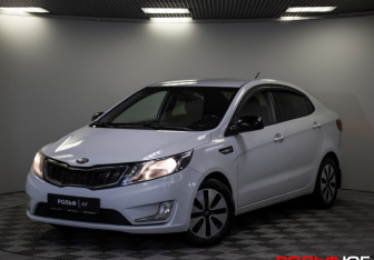 Подержанный автомобиль Kia Rio Sedan 2013 года (17 фото)