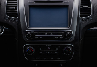 Подержанный автомобиль Kia Sorento 2015 года (14 фото)