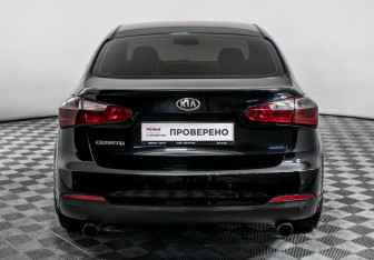 Подержанный автомобиль Kia Cerato Sedan 2014 года (6 фото)