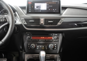 Подержанный автомобиль BMW X1 2012 года (14 фото)