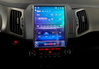 Подержанный автомобиль Kia Sportage 2012 года (14 фото)